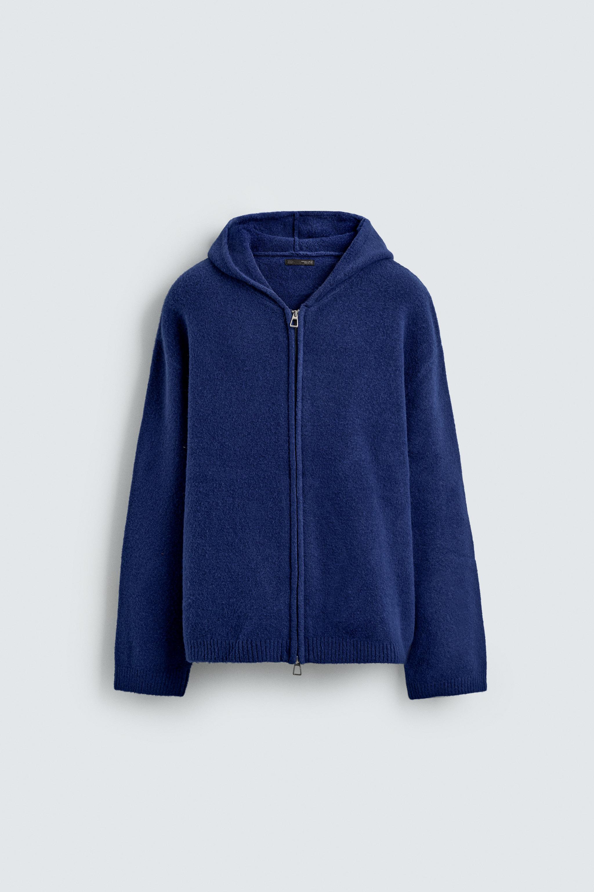 GILET EN MAILLE À CAPUCHE